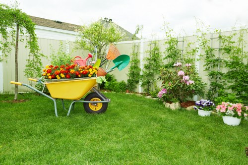 Professional stump grinder at work in Cleaners SW13